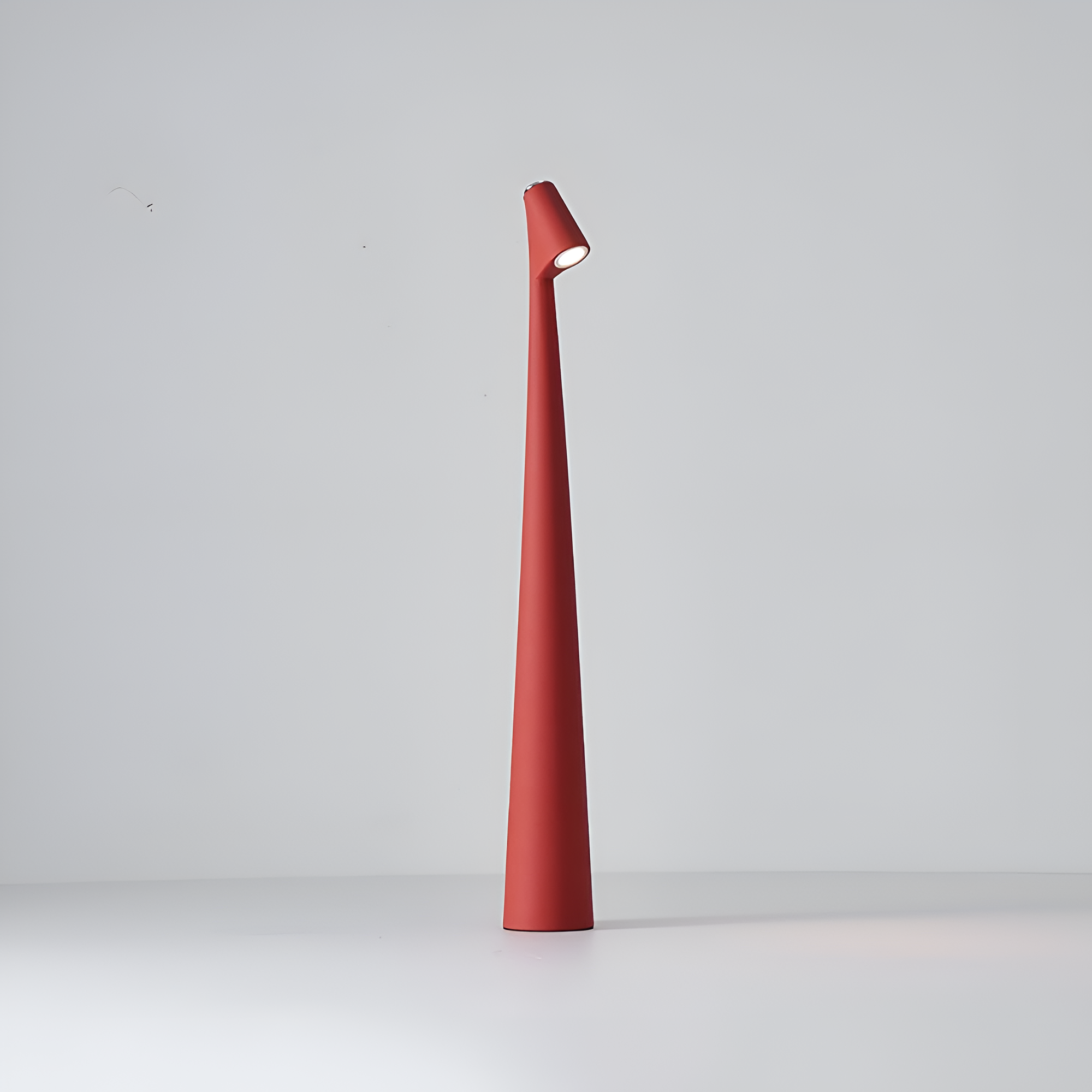 Red floor lamp on a white background