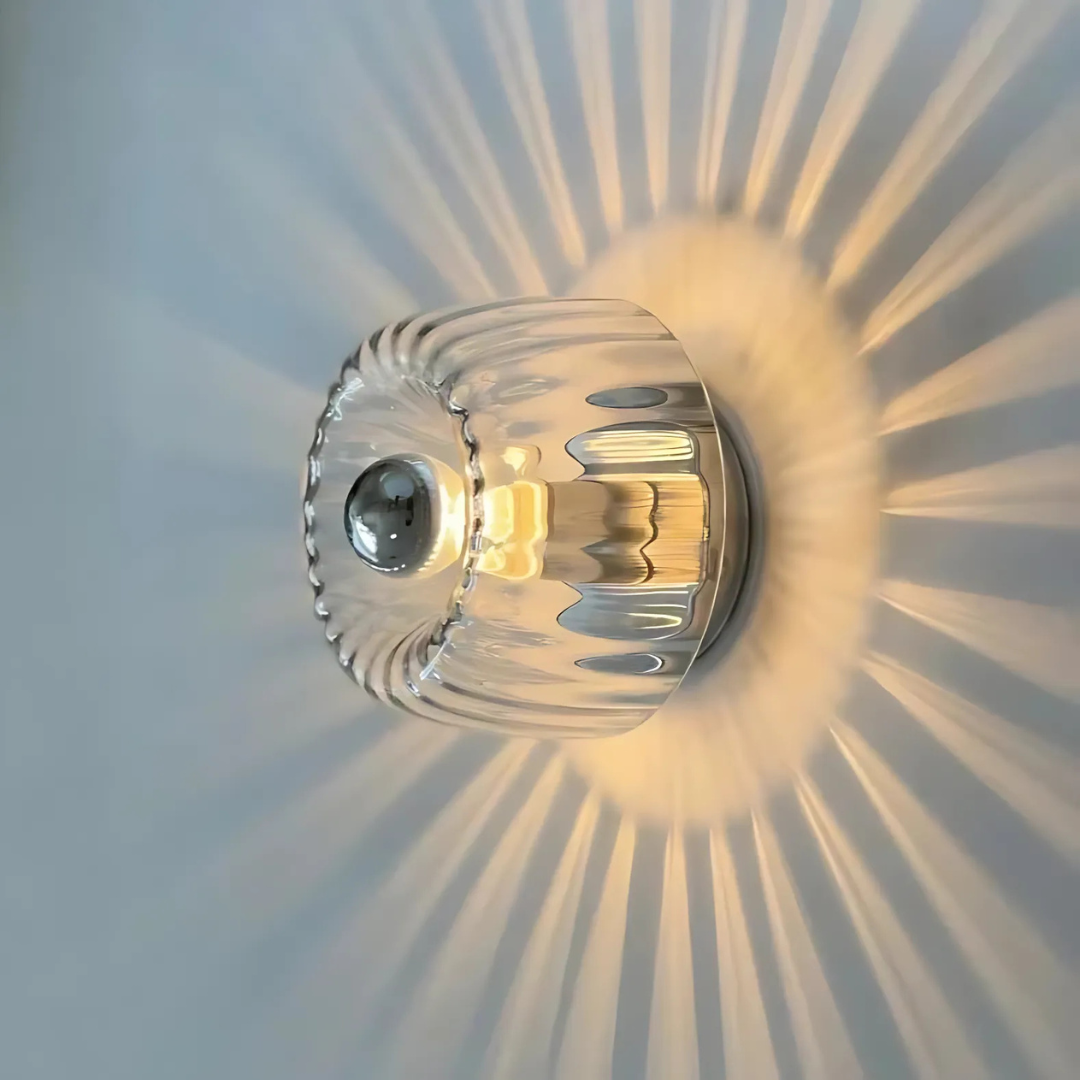 Fluted Glass Wall Sconce with Sunburst Glow