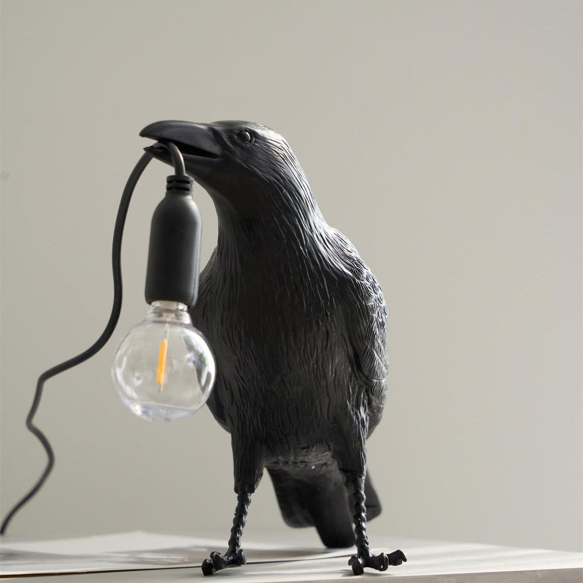Black Resin Raven Lamp with Hanging LED Bulb