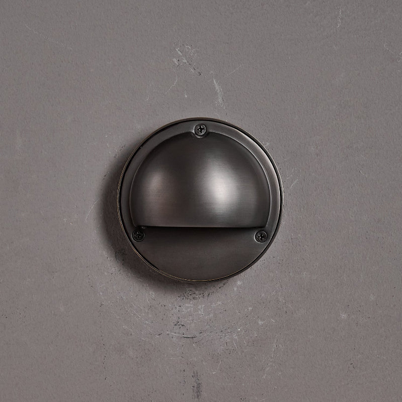 Round Brass Wall Sconce with Shielded Glow