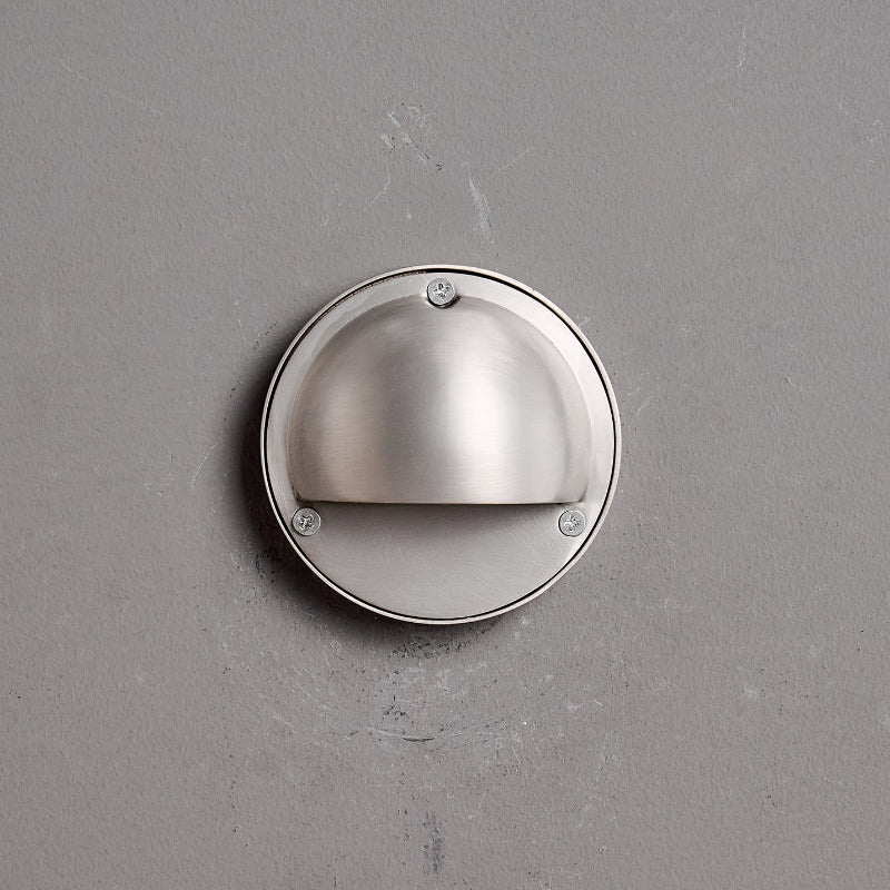 Round Brass Wall Sconce with Shielded Glow