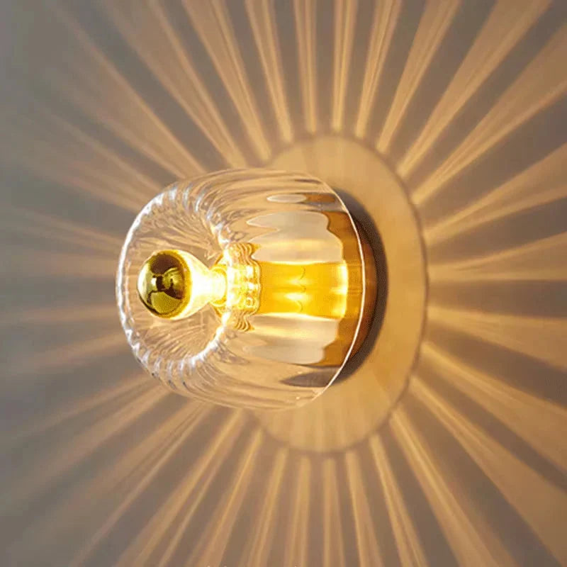 Fluted Glass Wall Sconce with Sunburst Glow