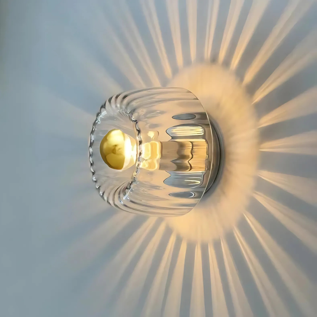 Fluted Glass Wall Sconce with Sunburst Glow