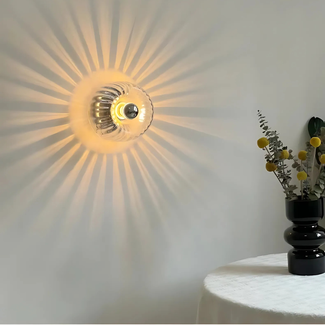 Fluted Glass Wall Sconce with Sunburst Glow