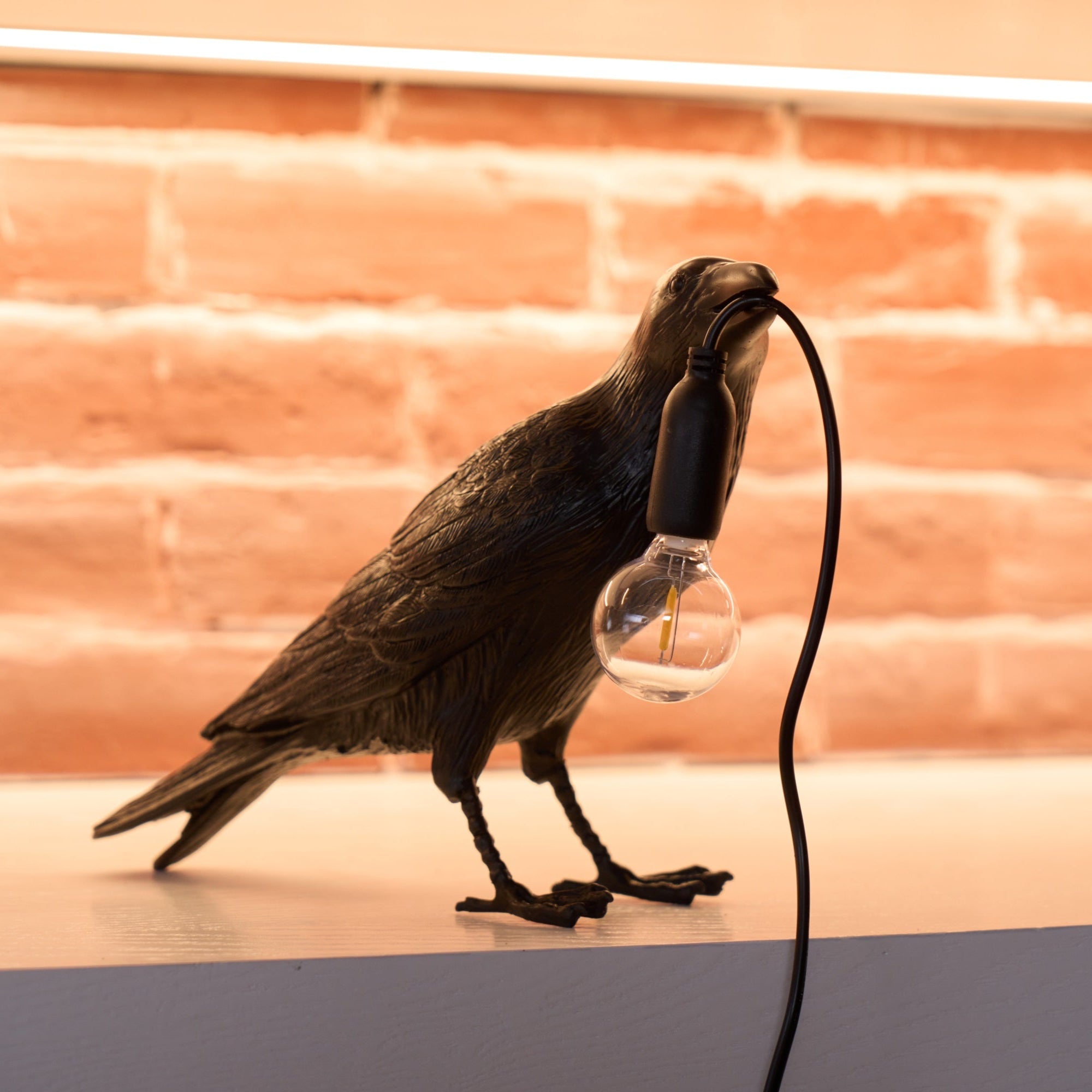 Black Resin Raven Lamp with Hanging LED Bulb