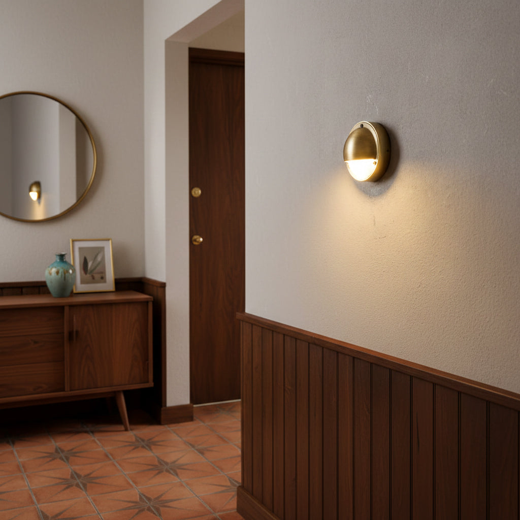 Round Brass Wall Sconce with Shielded Glow