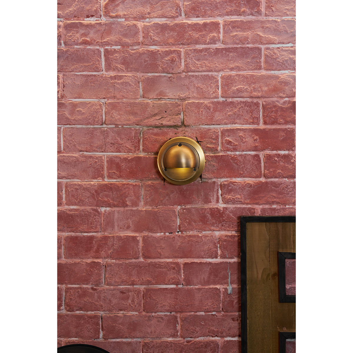 Round Brass Wall Sconce with Shielded Glow