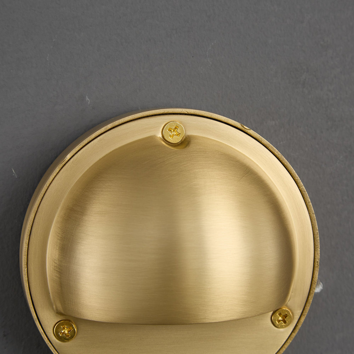 Round Brass Wall Sconce with Shielded Glow