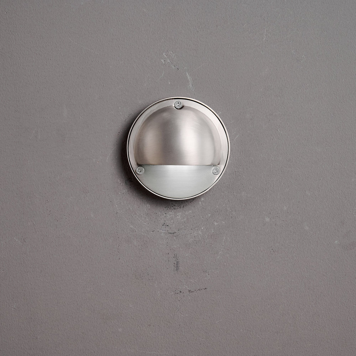 Round Brass Wall Sconce with Shielded Glow