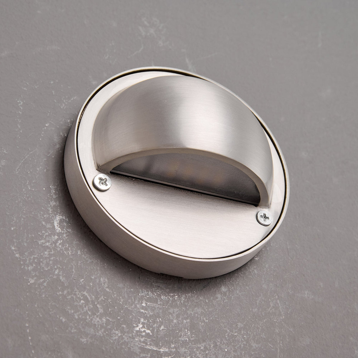 Round Brass Wall Sconce with Shielded Glow