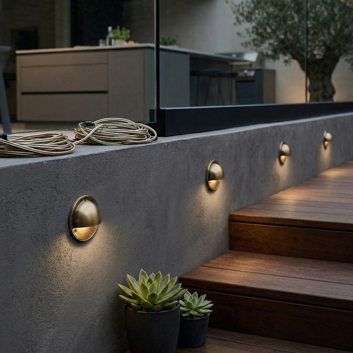 Round Brass Wall Sconce with Shielded Glow