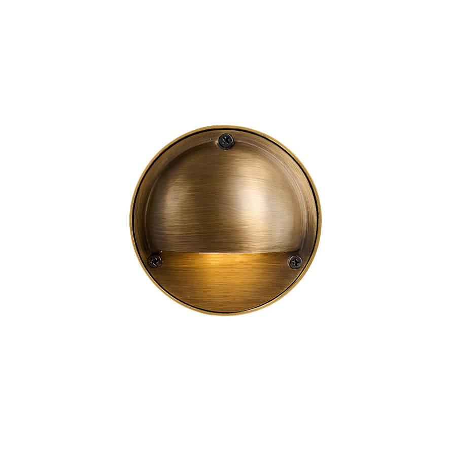 Round Brass Wall Sconce with Shielded Glow
