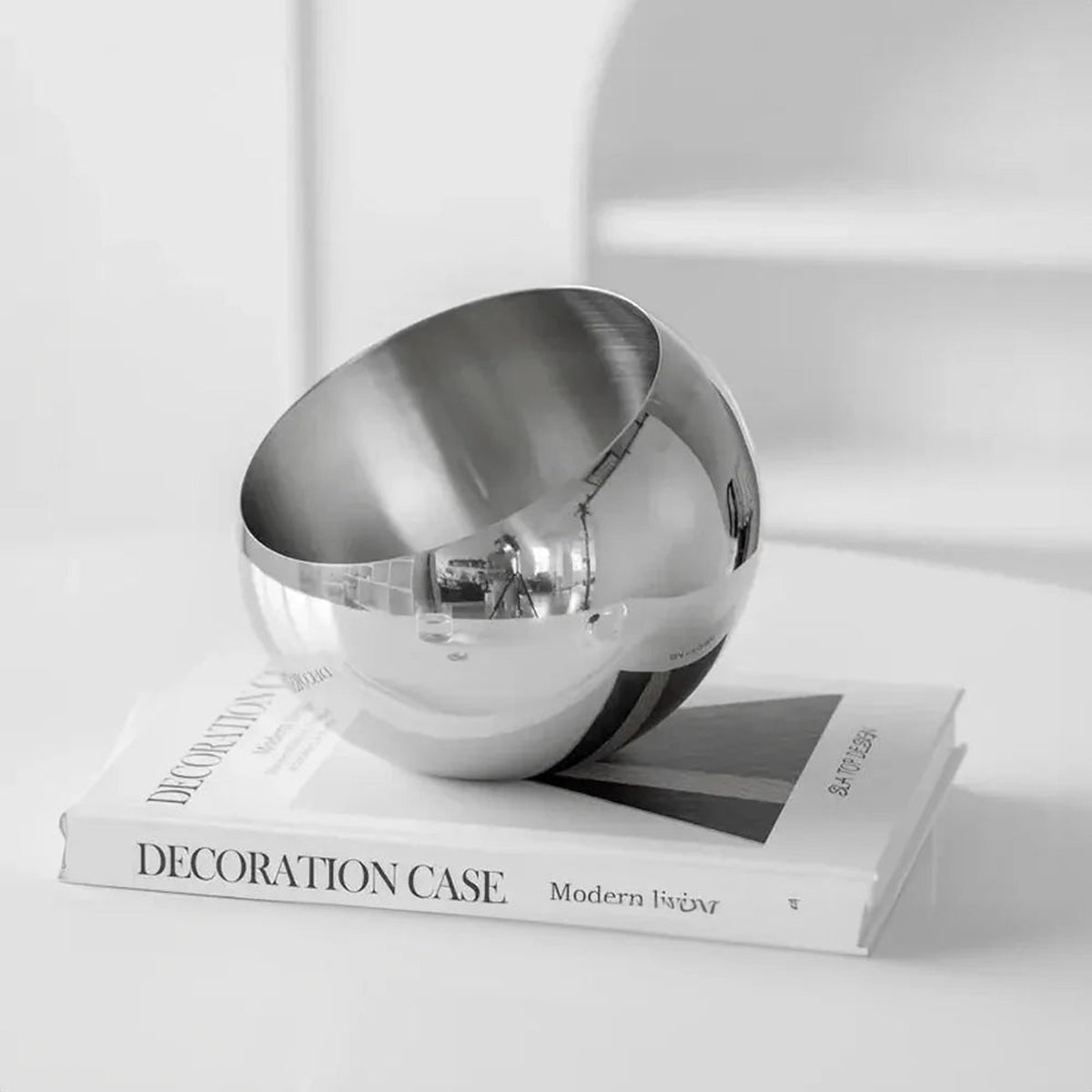 Polished Stainless Steel Fruit Bowl With Modern Open Design - Image 8